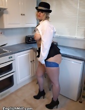 British mom puts on sexy police uniform and comes to kitchen