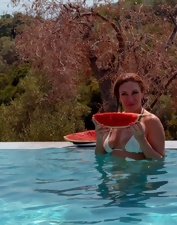 Juicy lesbian duo showing off by the swimming pool